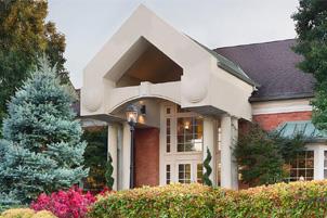 Image of the beautiful entrance of McKnight Place Assisted Living